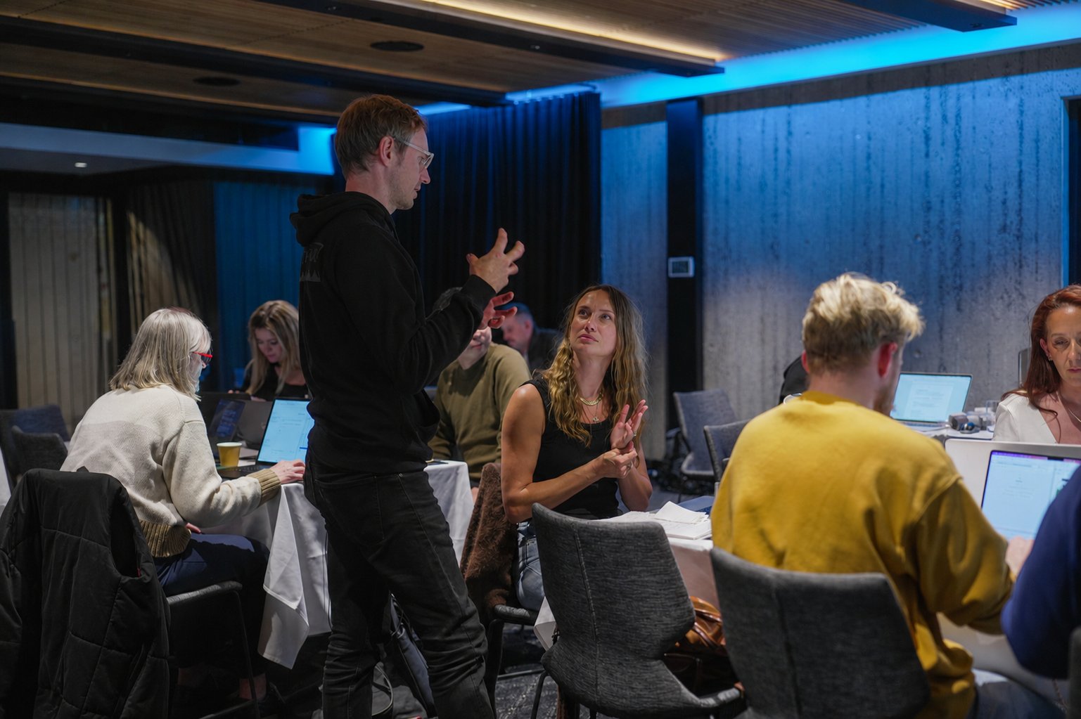 One-on-one mentoring at a Team 400 Claude AI training workshop in Brisbane